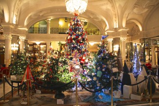 View of the forest of Christmas trees ready for the charity auction in the lobby of the Hotel de Paris @CelinaLafuenteDeLavotha